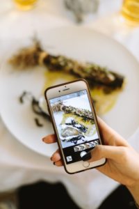 restaurant marketing ideas - taking a picture of food